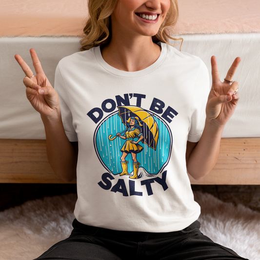 Don't Be Salty: Classic Morton's Salt Girl with Yellow Umbrella on Bella Canvas 3001 Unisex Short Jersey Tee Extended sizes available