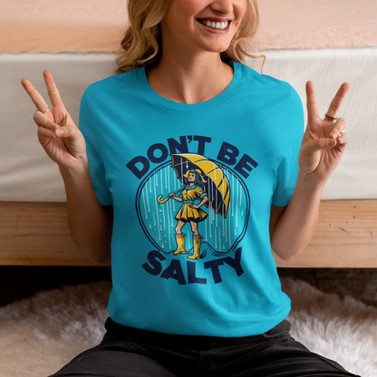 Don't Be Salty: Classic Morton's Salt Girl with Yellow Umbrella on Bella Canvas 3001 Unisex Short Jersey Tee Extended sizes available